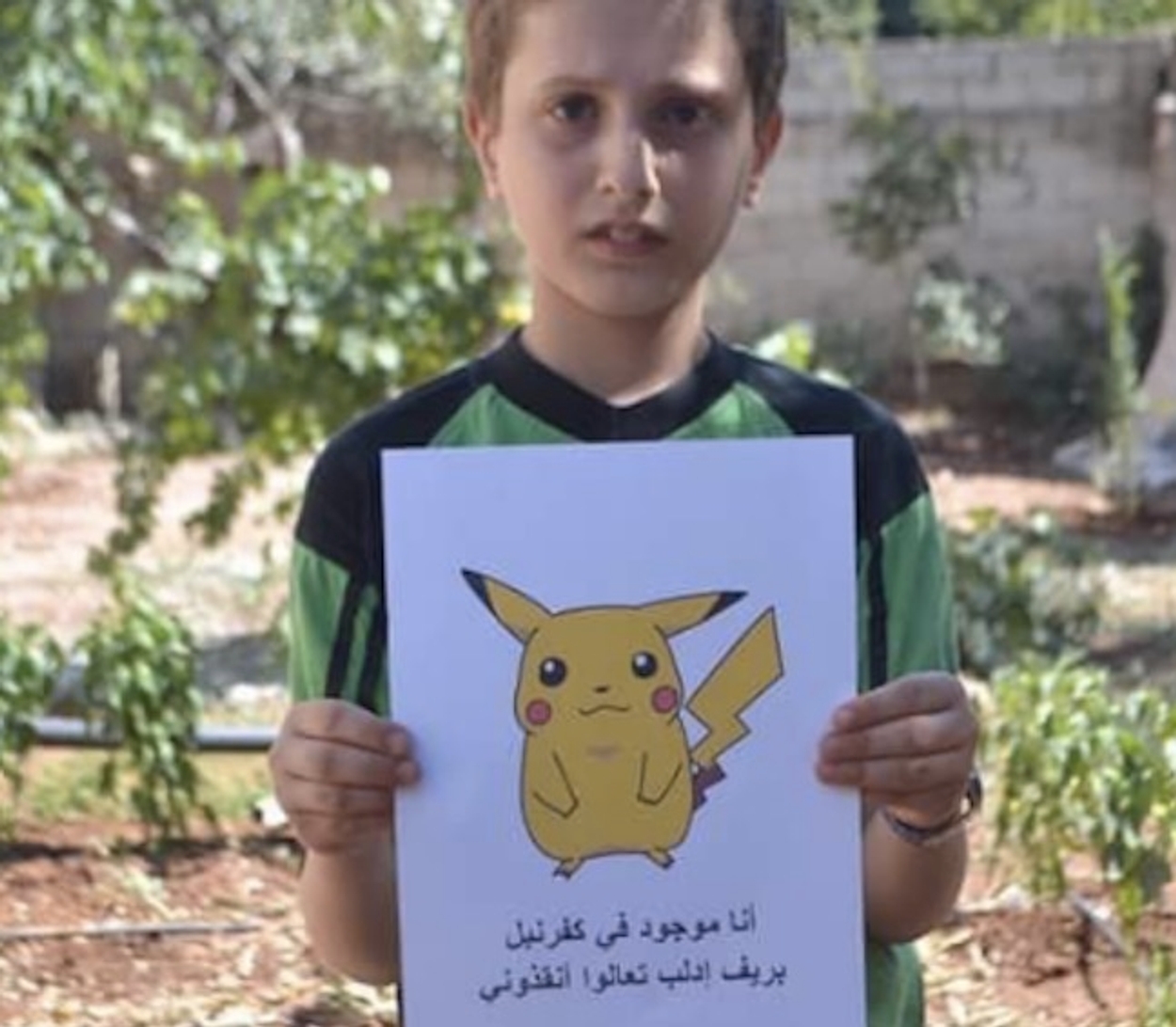 Afbeelding van Syrische kinderen vragen om redding door te doen alsof ze Pokémons zijn