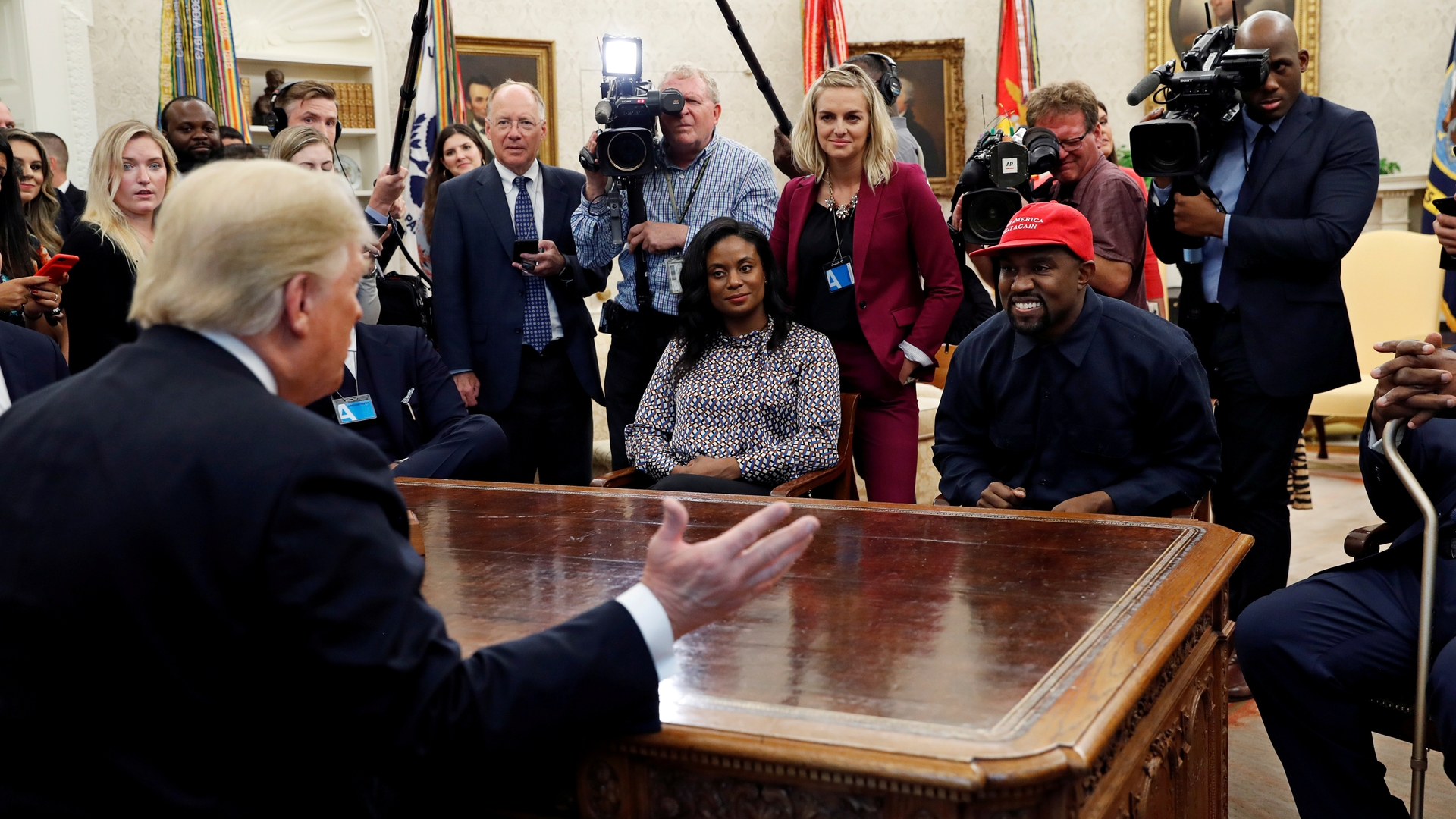 President Trump speaks during a meeting with rapper Kanye West and others in the Oval Office at the White House in Washington