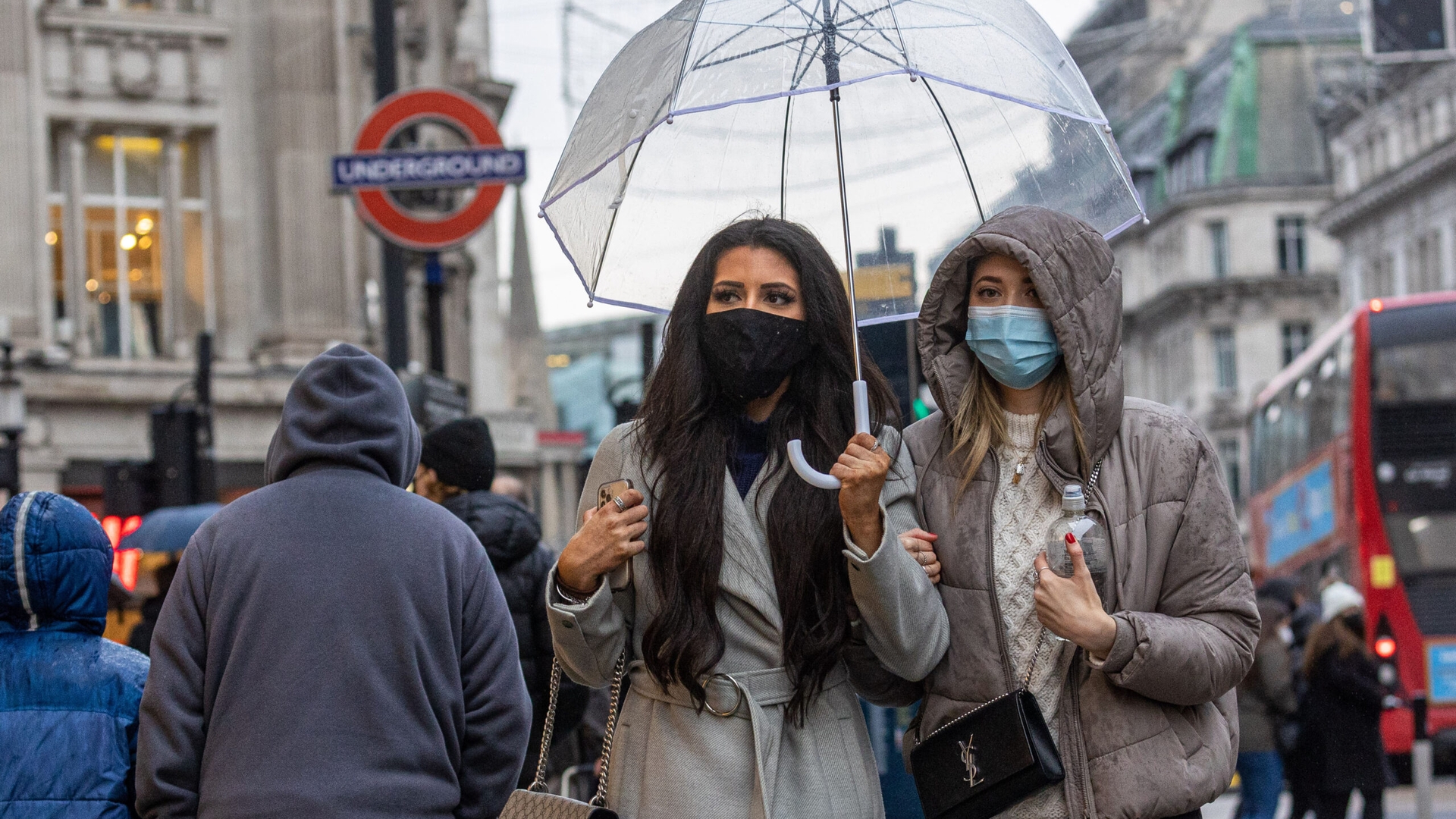 Christmas shoppers in face masks in Londons West End.