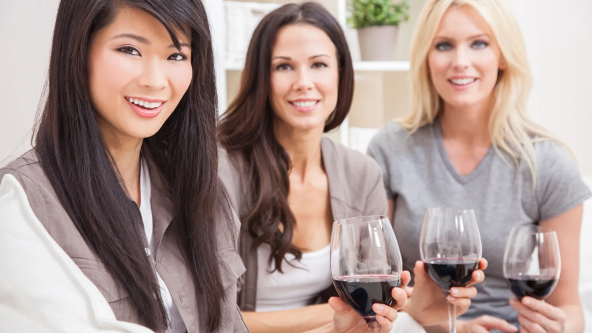 Interracial Group Three Women Friends Drinking Wine