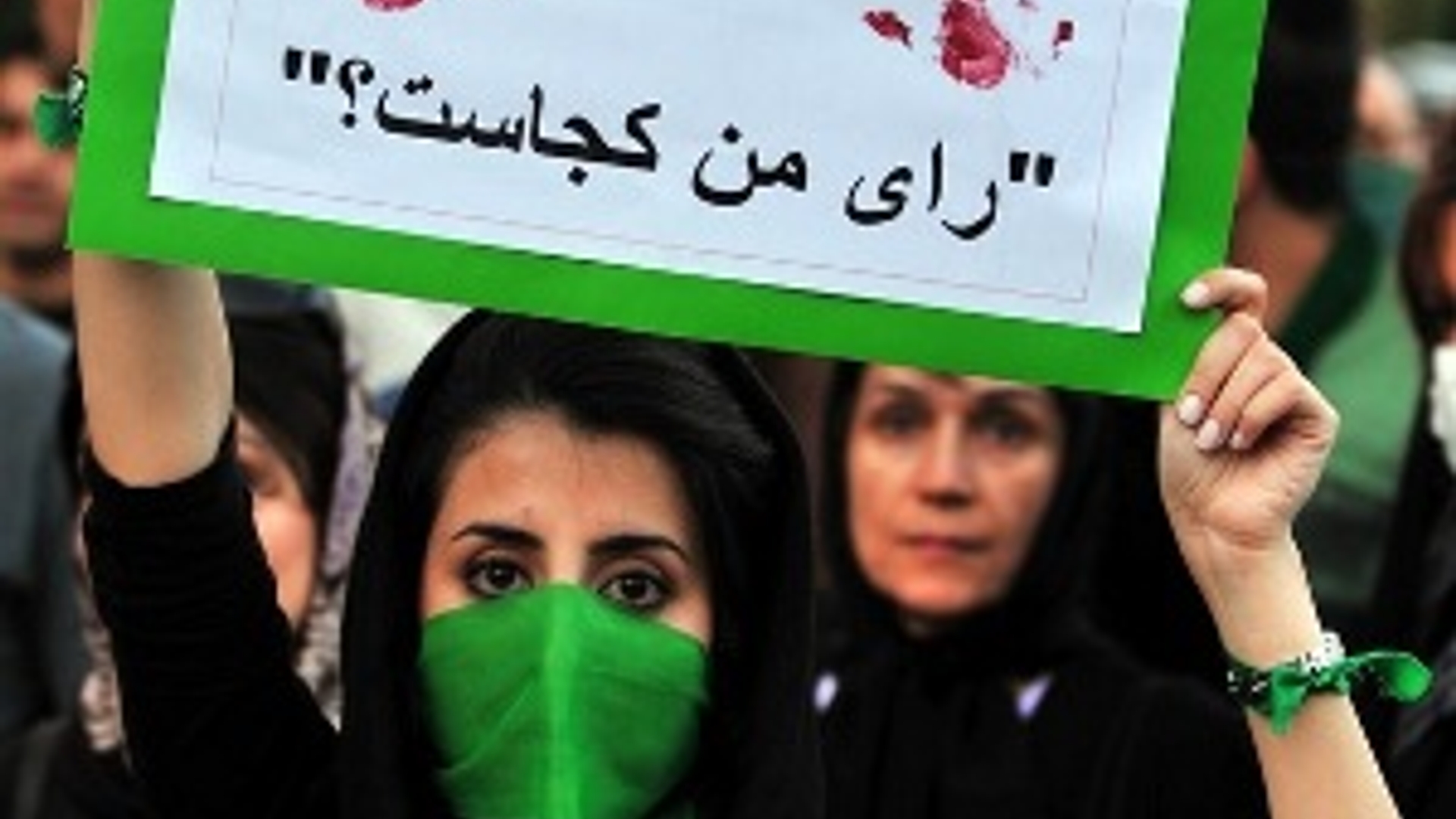 iran-protester-sign.jpg