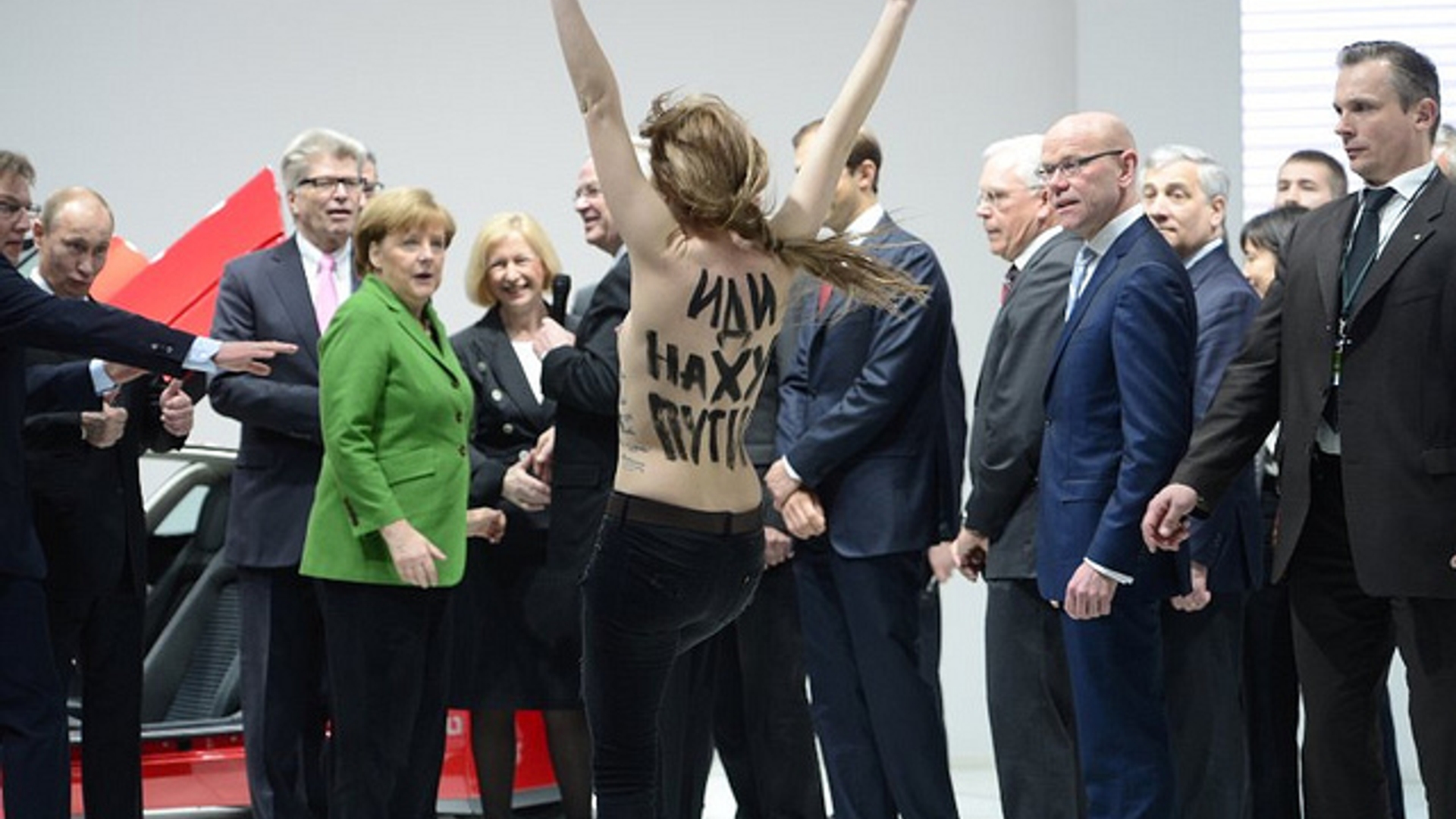 Angela Merkel im grünen Jackett